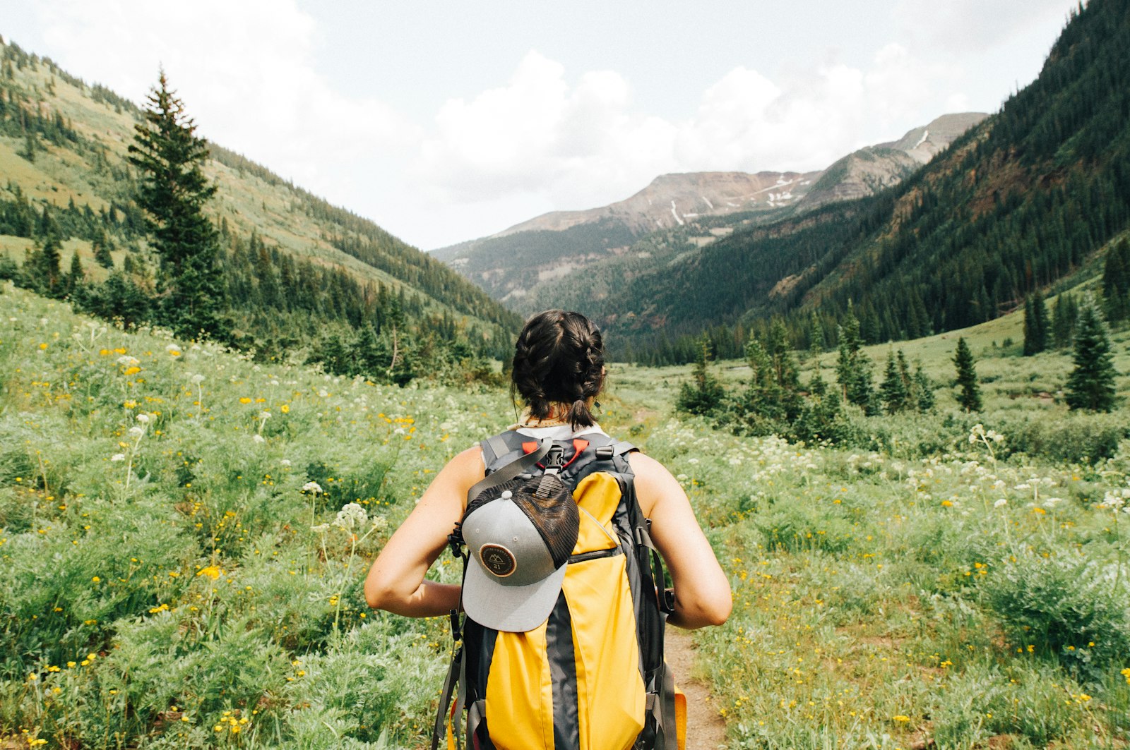 A hiker on a high mountain trail